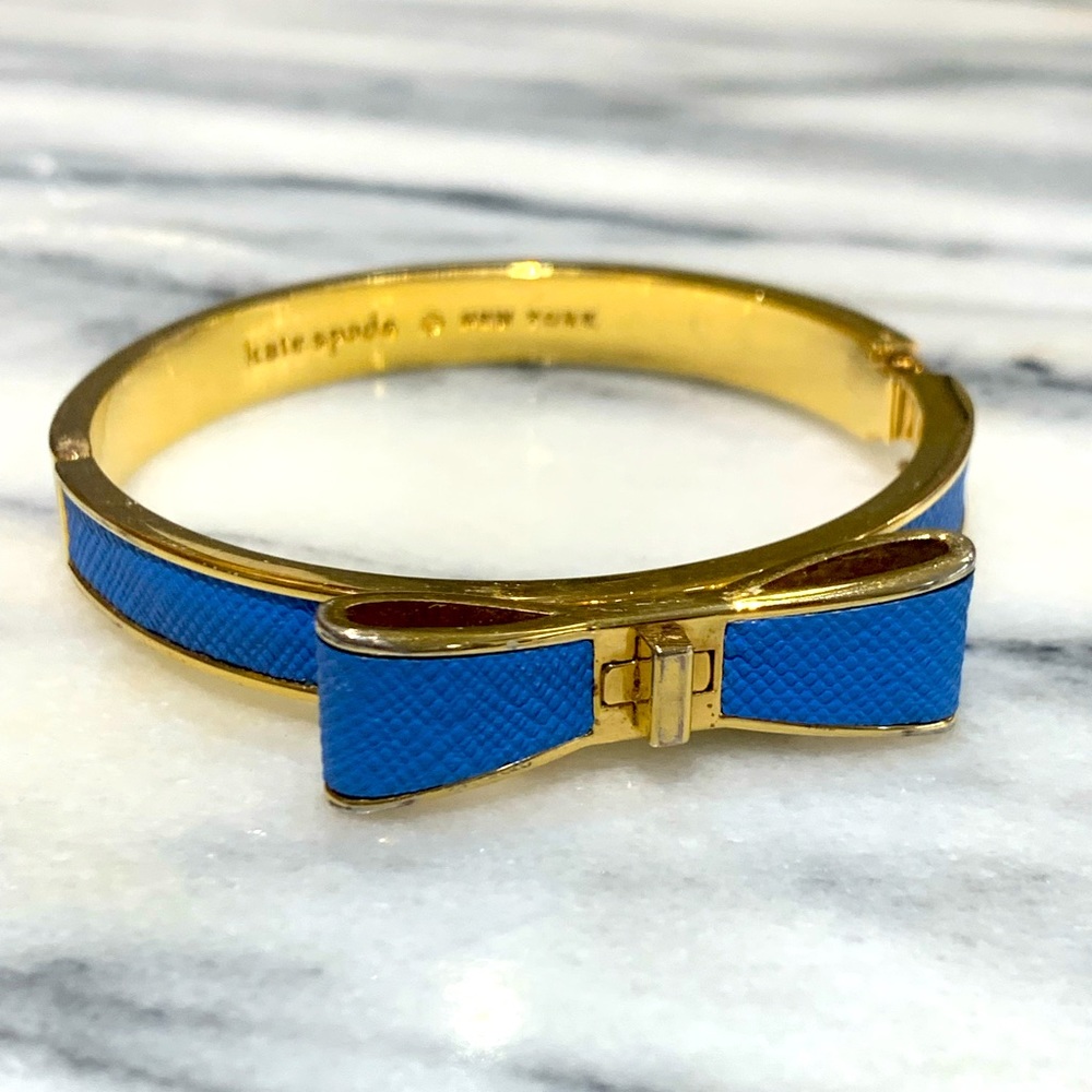 Kate Spade Gold tone blue bow bracelet